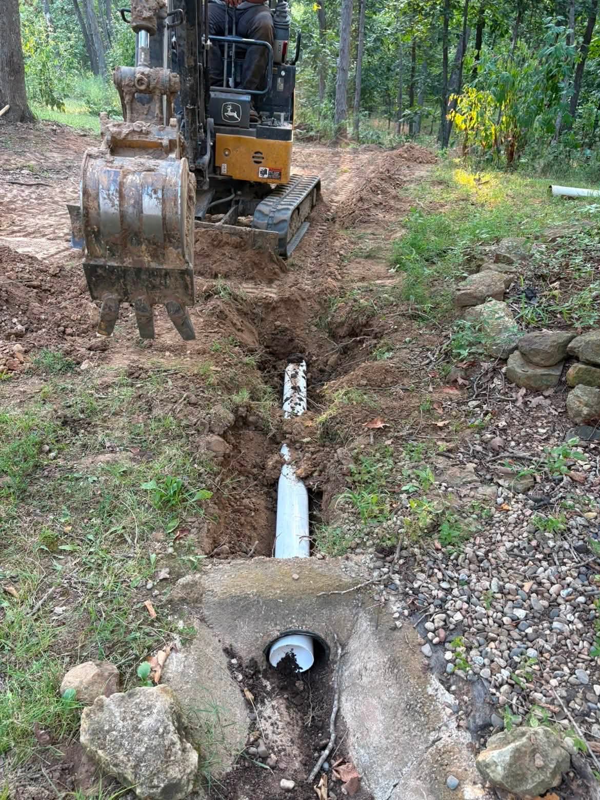 Sewer line excavation and PVC install for a Vernon County plumbing project